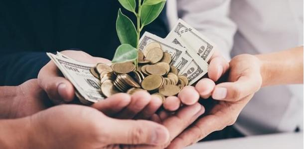لدعم المشروعات الصناعية والزراعية والخدمية.. اعرف مزايا برنامج تمويل الأهلي بيزنس